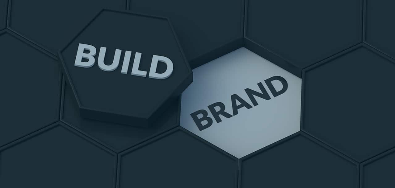 the words Build and Brand together to form a puzzle